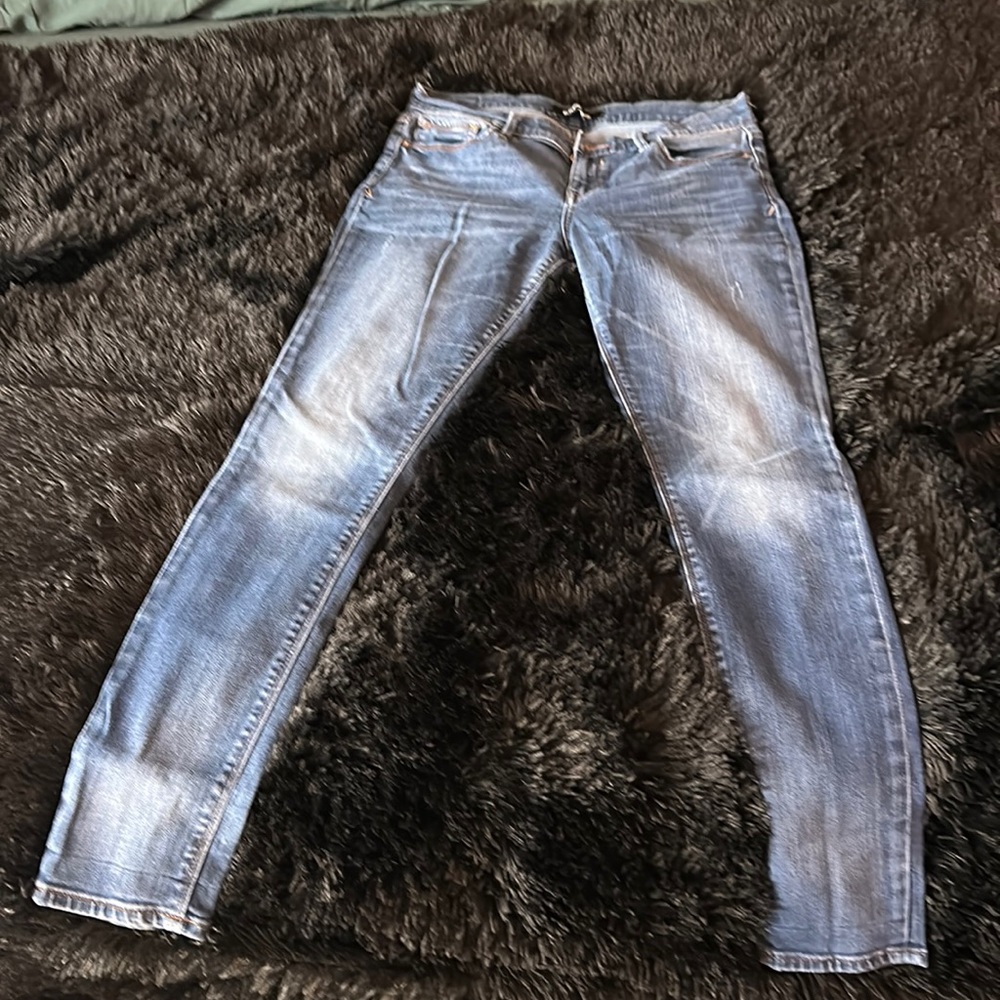 Express medium wash mid rise skinny jeans size 8R